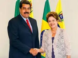 Diplomacia presidencial À esquerda, Nicolás Maduro, à direita, Dilma Rousseff.